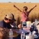 Meal with farm family in the field at harvest